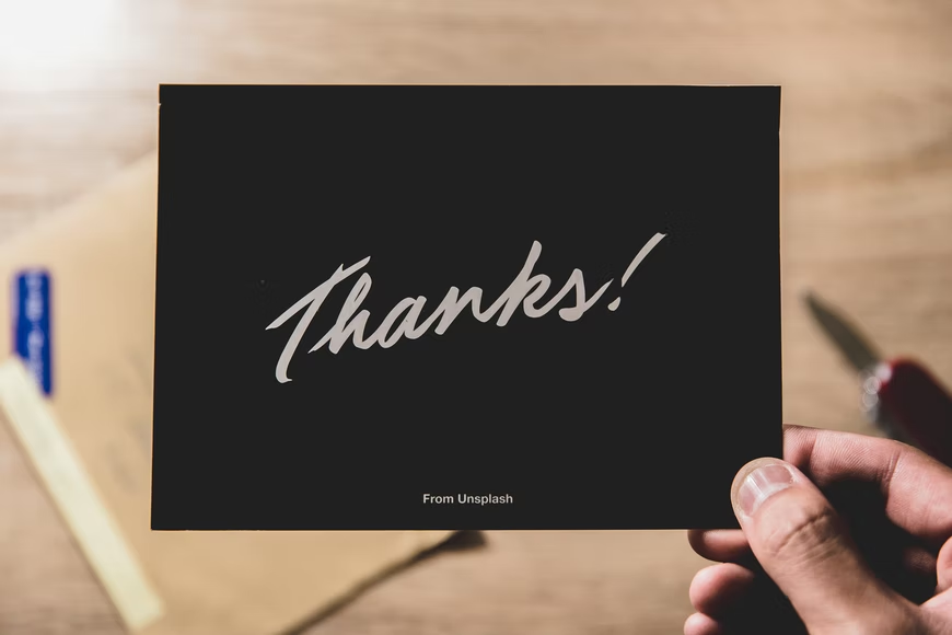 A card saying "Thanks!" as a corporate gift.